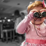 Girl with Binoculars Representing Media
