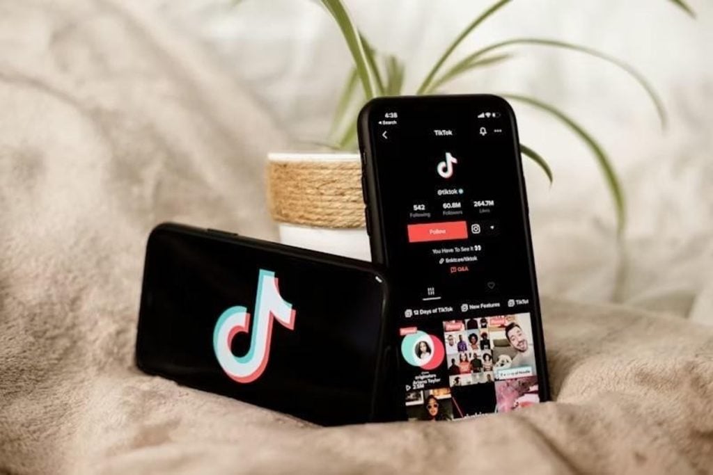 Two smartphones side by side showing the TikTok app interface and video feed