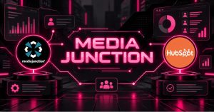 Media Junction and HubSpot logos linked by neon circuitry, representing HubSpot implementation agency reviews and pricing
