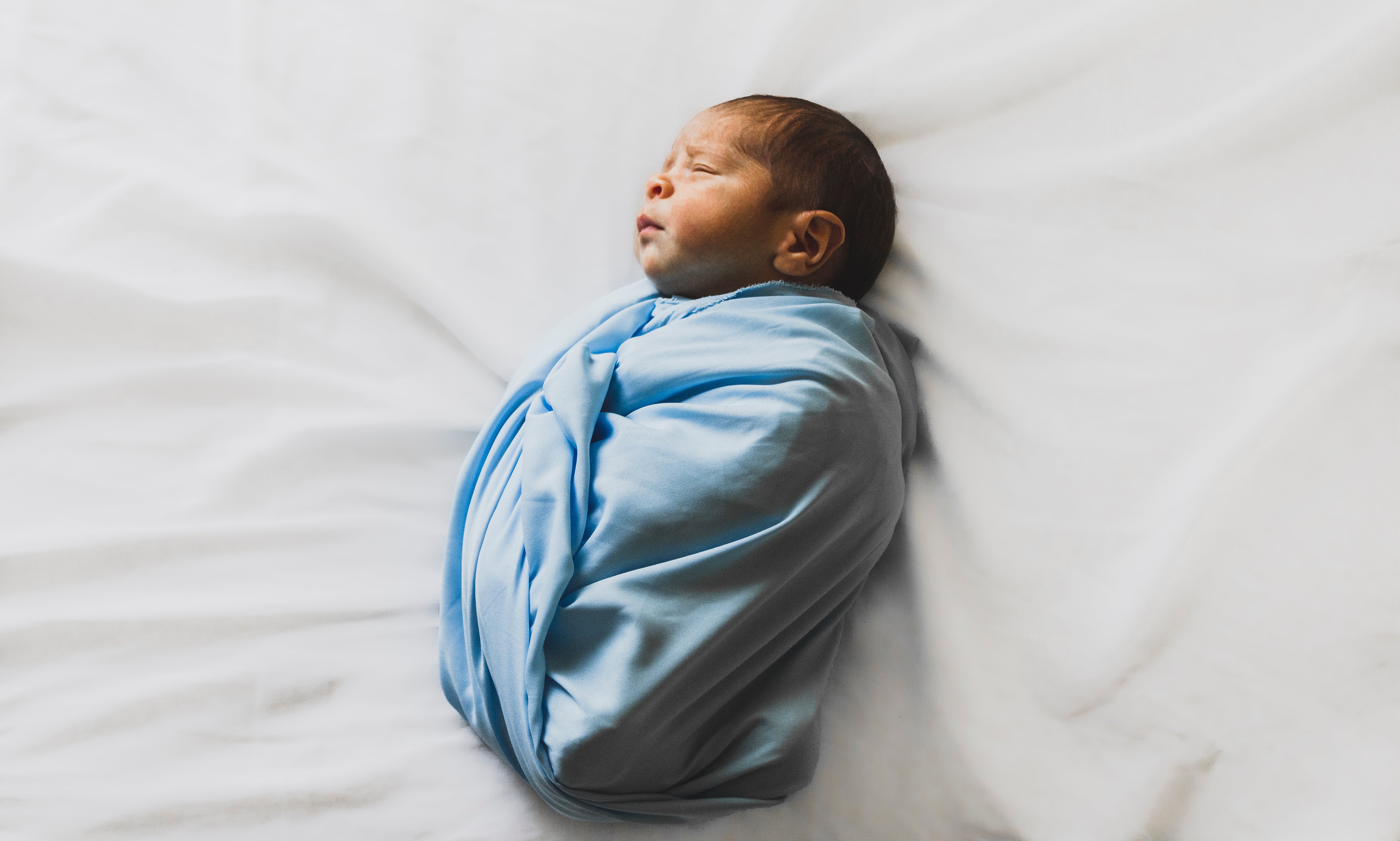 Get The Most Photogenic Gender-Neutral Baby Swaddles For A Newborn’s First Shoot